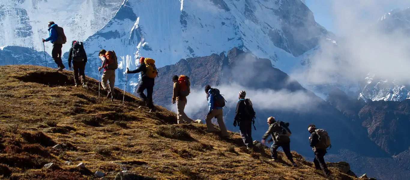 Group of people trekking on the Himalayas mountain in India